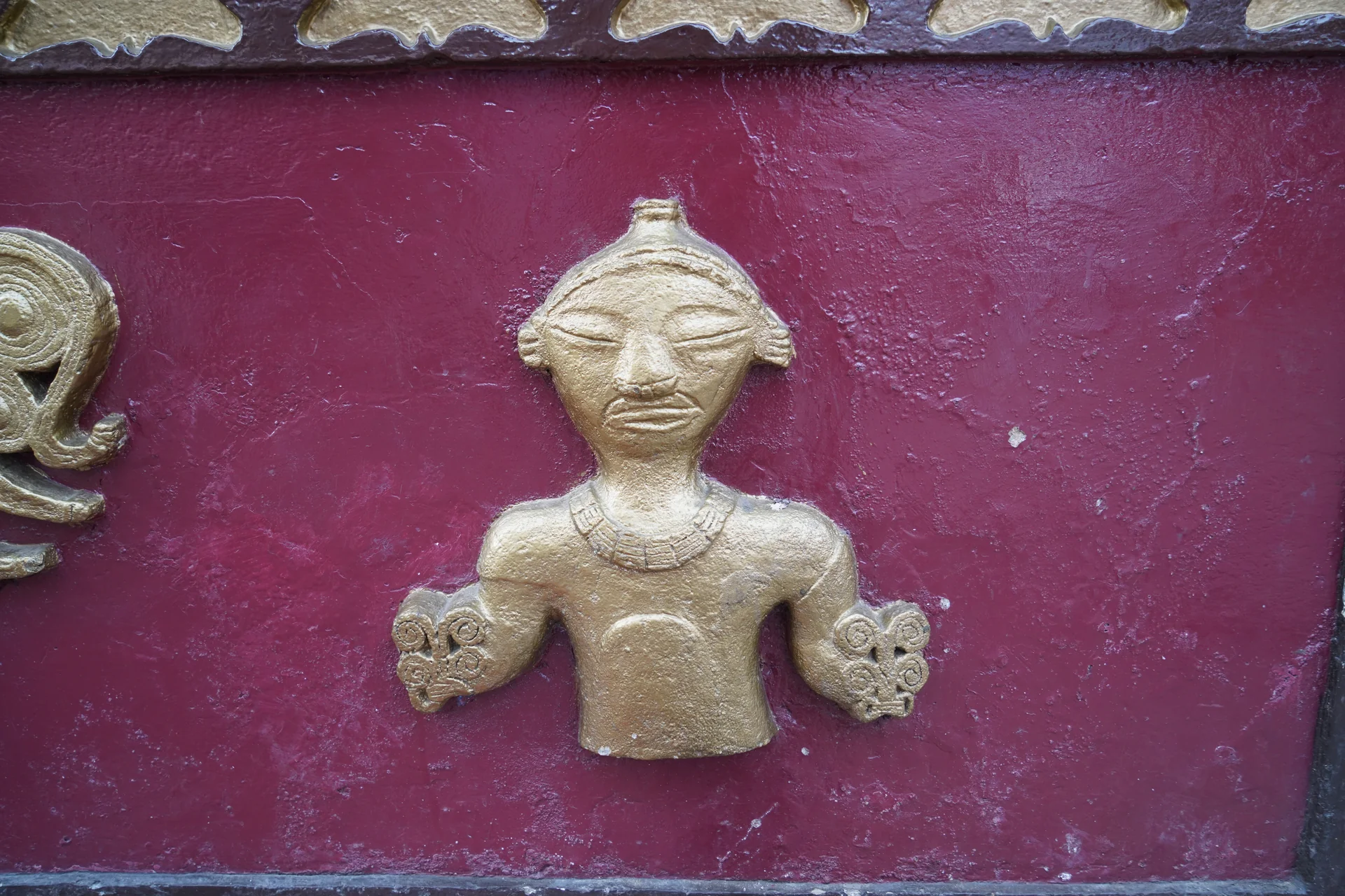 Pre-colonial Tahamí traditions and culture in colorful zócalo relief art, Guatapé